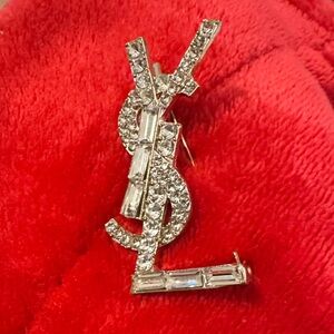 Yves Saint Laurent Rhinestone YSL Pin Brooch on Red